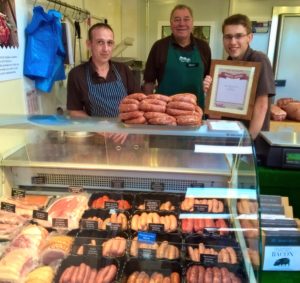 photo-of-steve-dave-and-james-bronze-sausage-award-three-trees