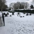 Snow in graveyard