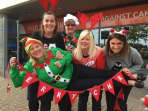 Fundraisers dressed in Christmas jumpers
