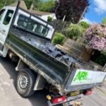 Lorry with bin bags of rubbish in