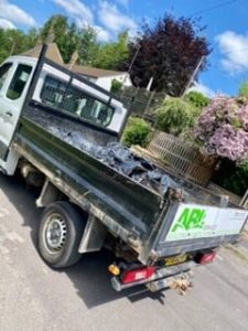 Lorry with bin bags of rubbish in