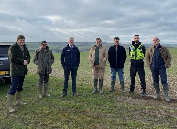 Wiltshire PCC Philip Wilkinson and others in a field