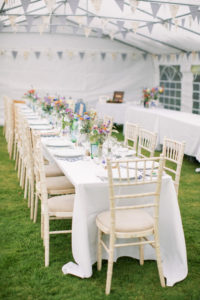 Interior of marquee with chairs and table