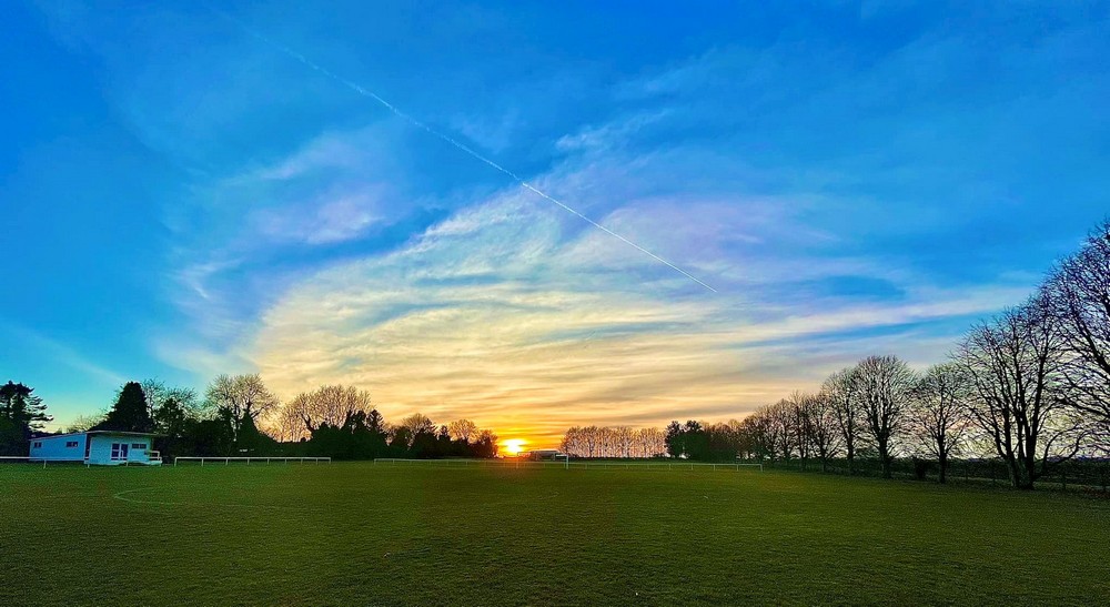 Chiseldon Recreation Field with sun low in sky
