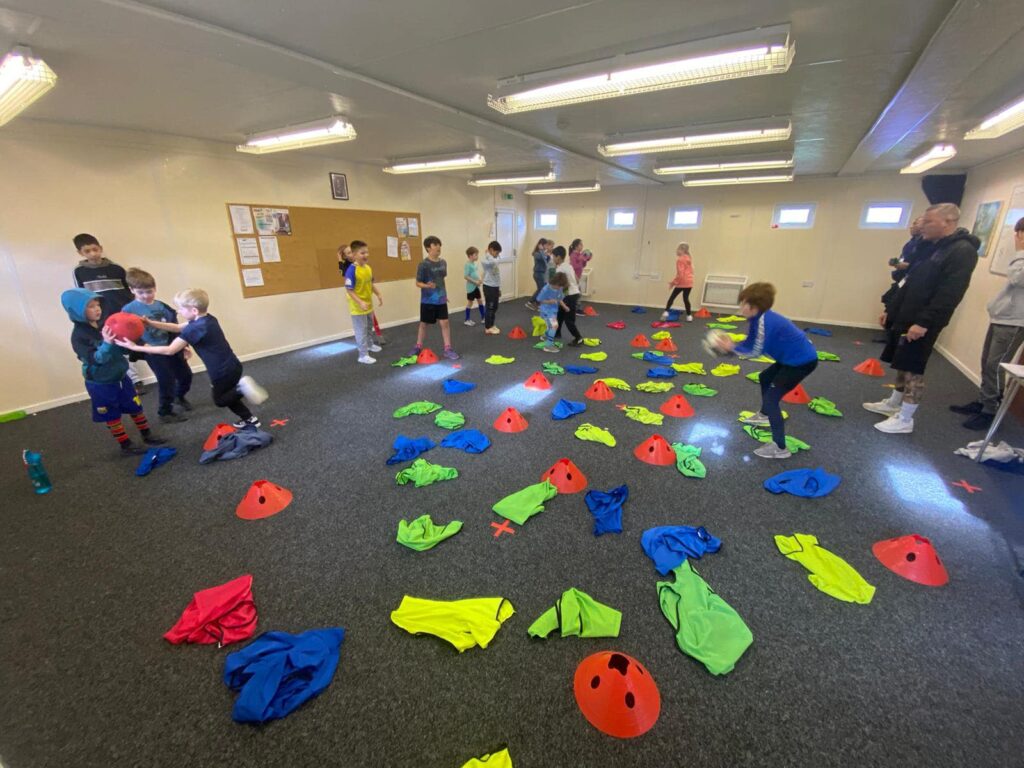 Children engaged in indoor activity.